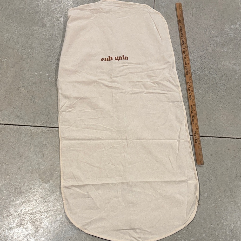 cult gaia cream dust bag with brown logo